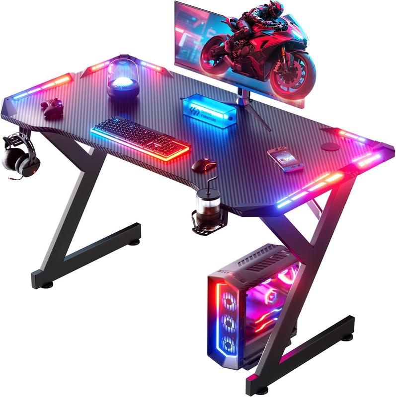 Bureau gaming avec LED, bureau gaming 100/120/140/160 x 60 cm, bureau d’ordinateur stable avec revêtement en fibre de carbone, bureau gamer avec porte gobelet et crochet pour casque, noir