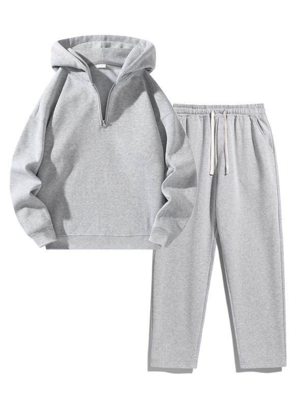Ensemble de survêtement uni pour homme, deux pièces ou trois pièces : sweat à demi‑zip avec épaules tombantes, coupe classique, et pantalon de survêtement avec poches et cordon de serrage ; vêtements pour homme