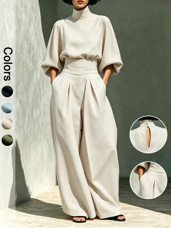 Ensemble deux pièces pour femme : haut à col montant et manches trois quarts, pantalon élégant de coupe ajustée, taille haute et jambes larges